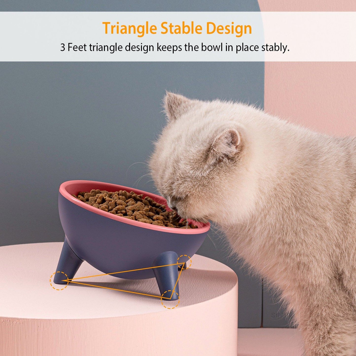 Two angled elevated pet bowls blue exterior with pink and yellow interiors, one filled with kibble