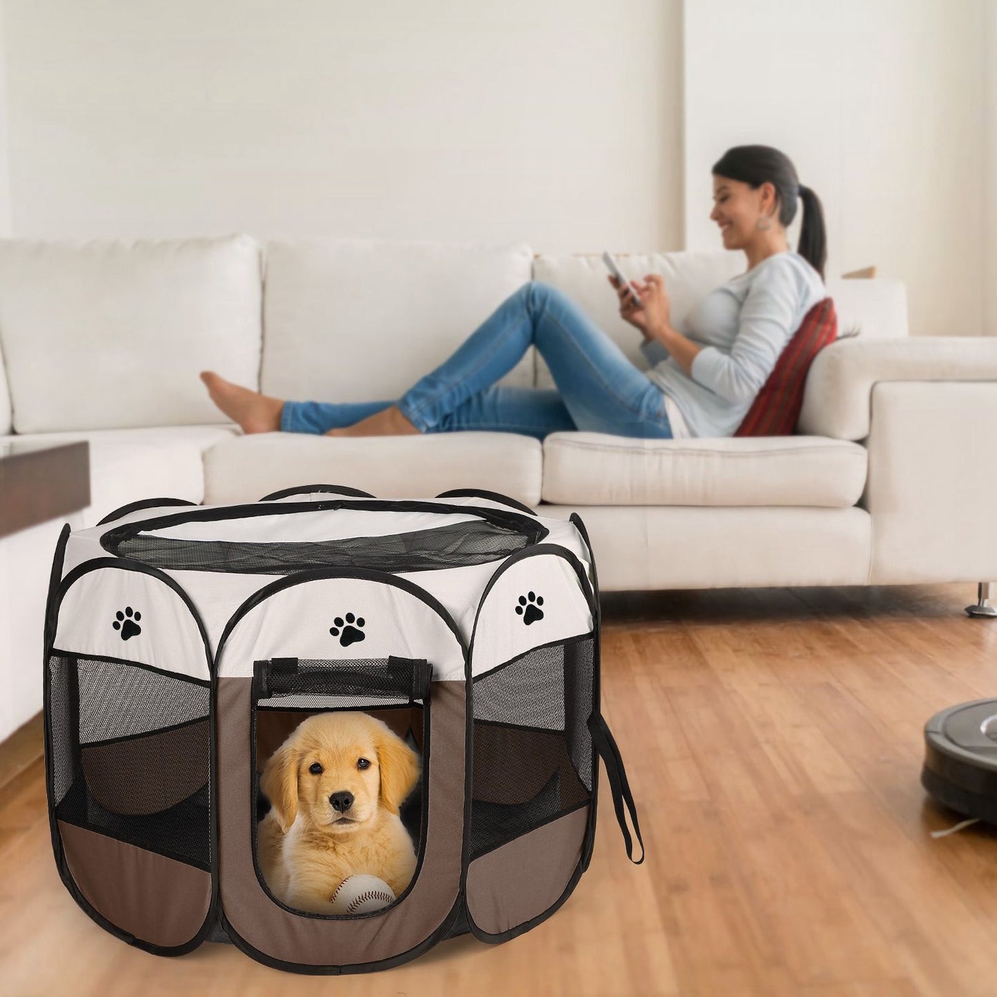Brown playpen on living room floor with small dog inside and person on sofa for scale