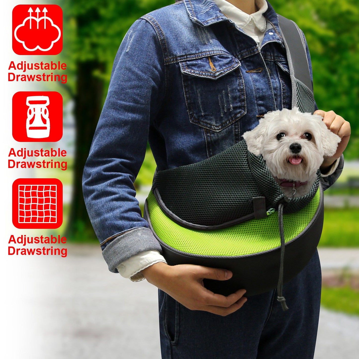 person wearing green pet sling carrier holding a small dog at chest