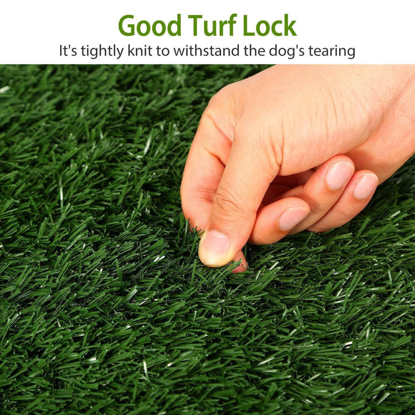 Fingers testing turf lock on artificial grass showing tight knit fibers