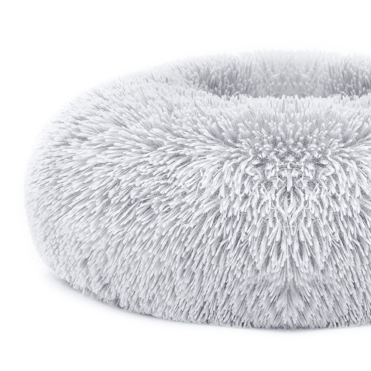 Close-up of grey bed edge showing dense plush fibers and rounded bolstered rim