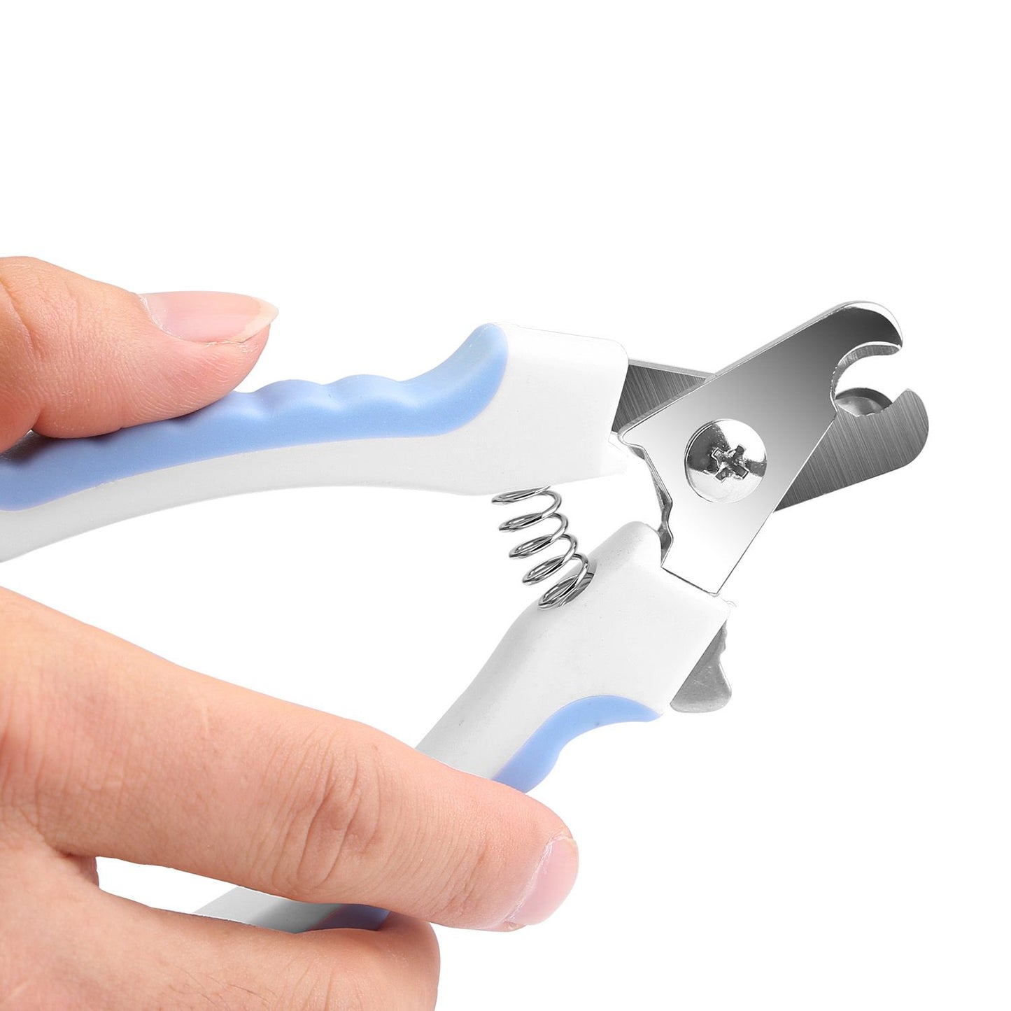 Close-up of stainless steel blade and coil spring mechanism on pet clippers
