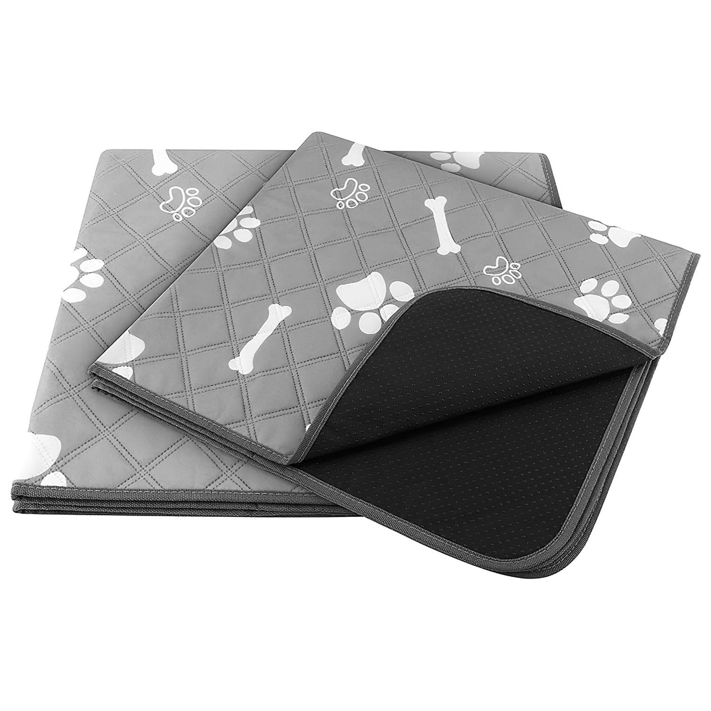 Stack of grey quilted pads with corner lifted to show black anti-slip dotted underside and layered construction