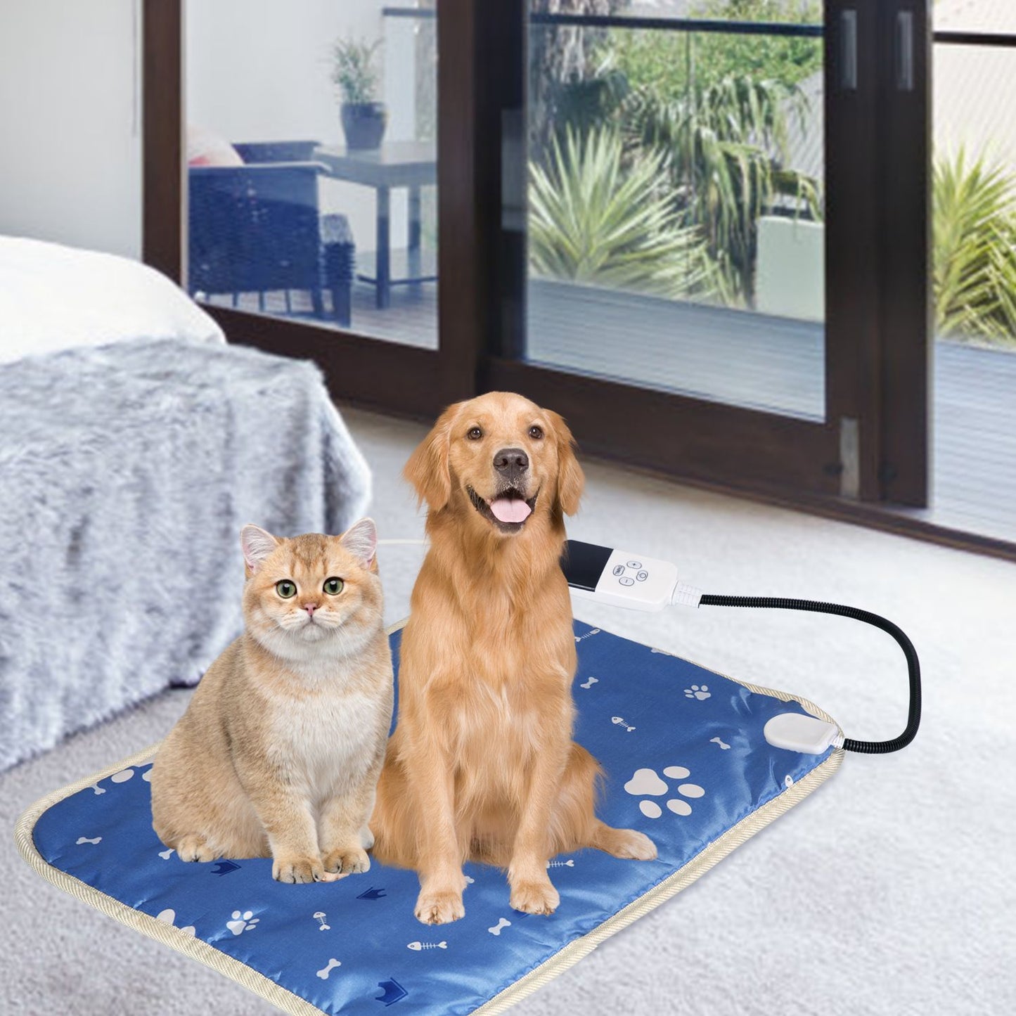 Pets resting on heated pad in bedroom near glass doors, controller and cord visible at pad edge
