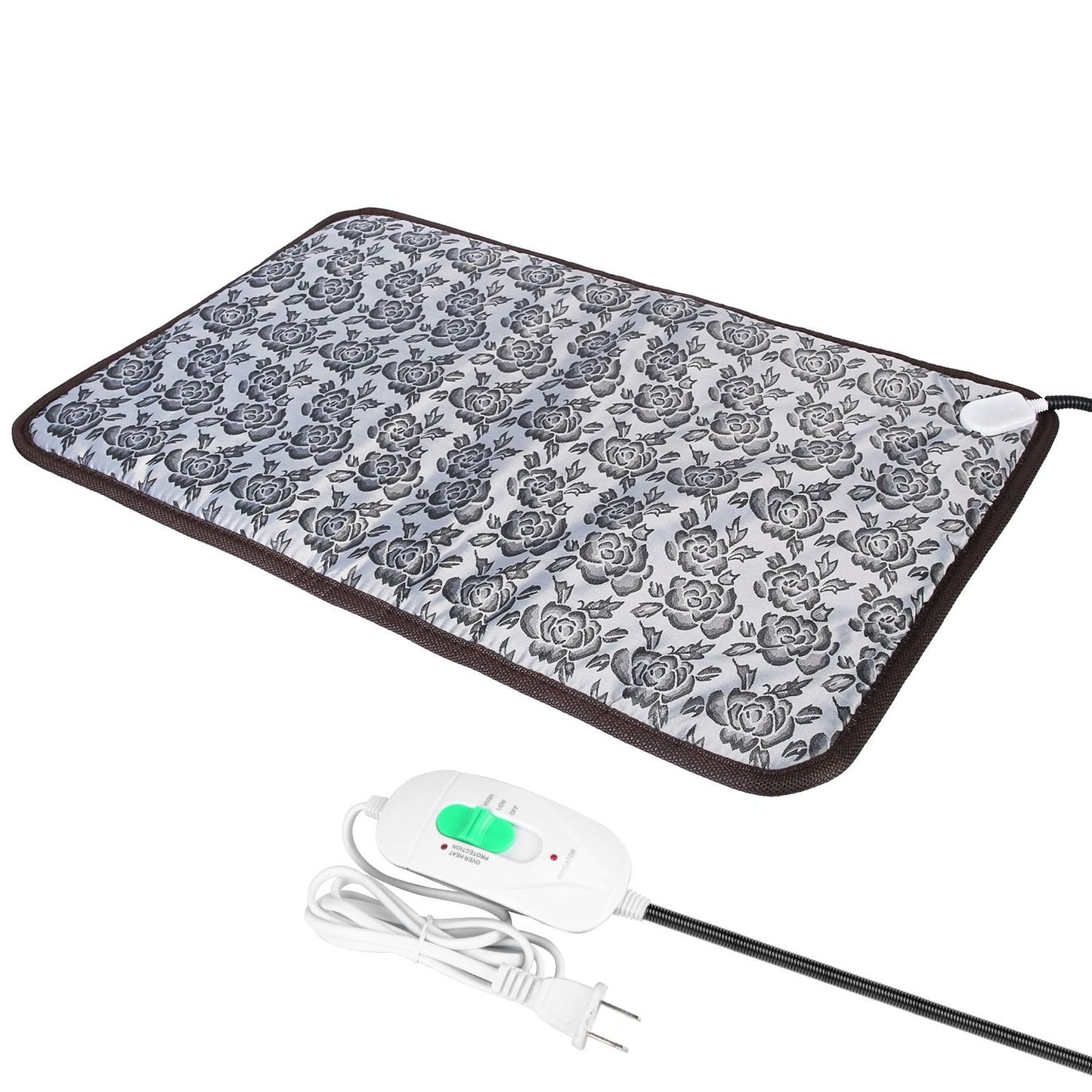 Angled view of floral heated pad with controller and coiled power cord