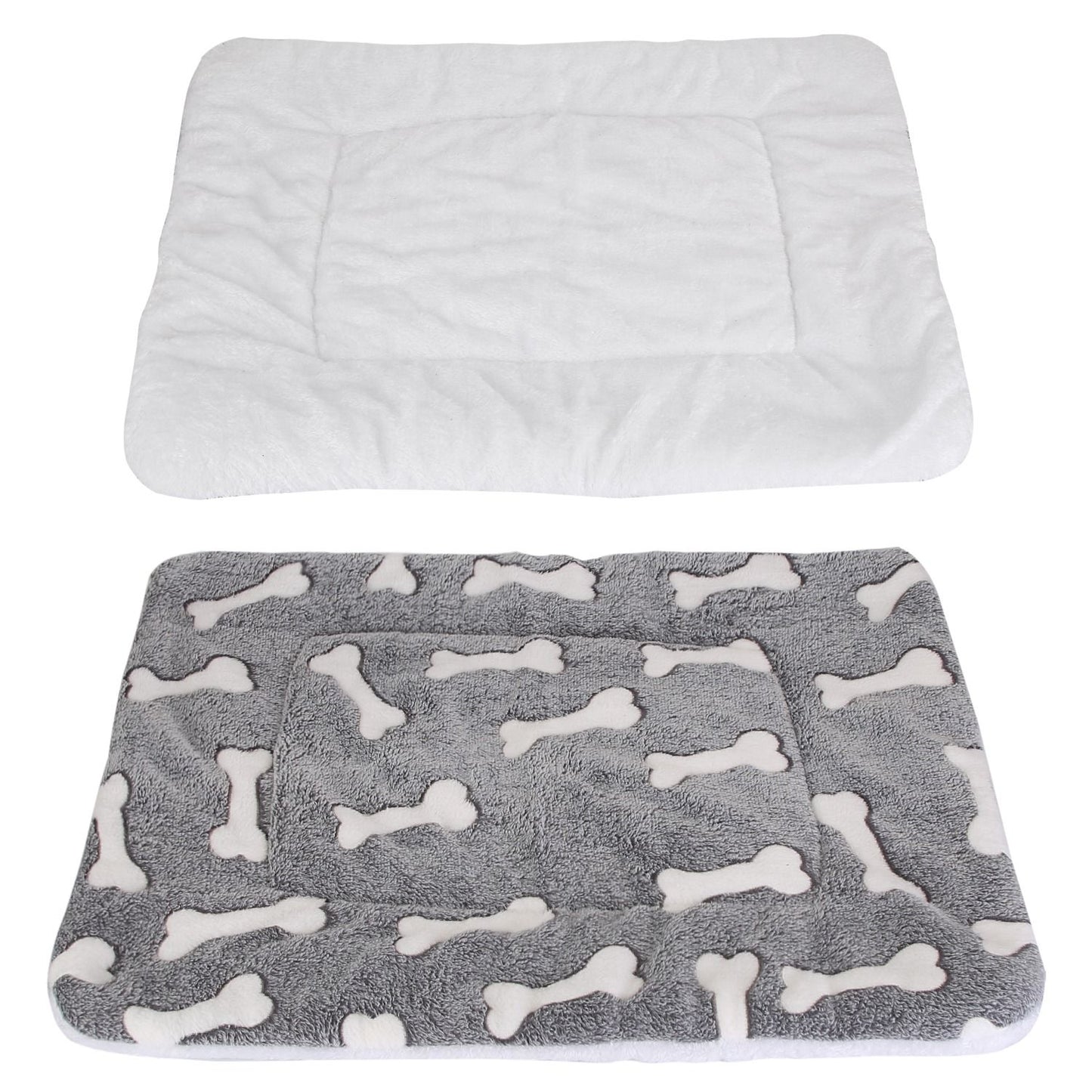 Two views showing white fluffy underside and grey bone-patterned top of the reversible pet mat