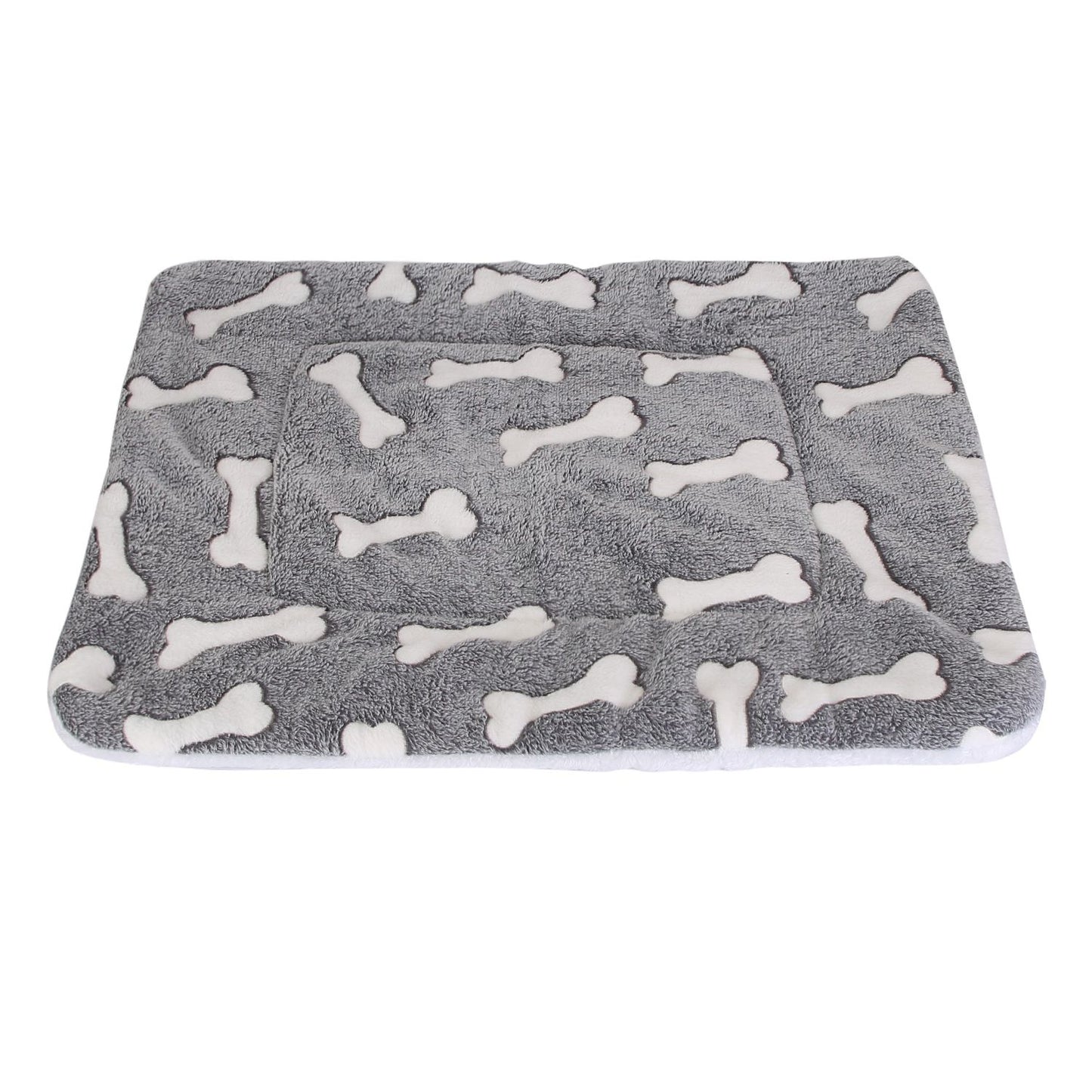 Top view of grey dog mat with white bone prints showing rectangular shape and stitched perimeter