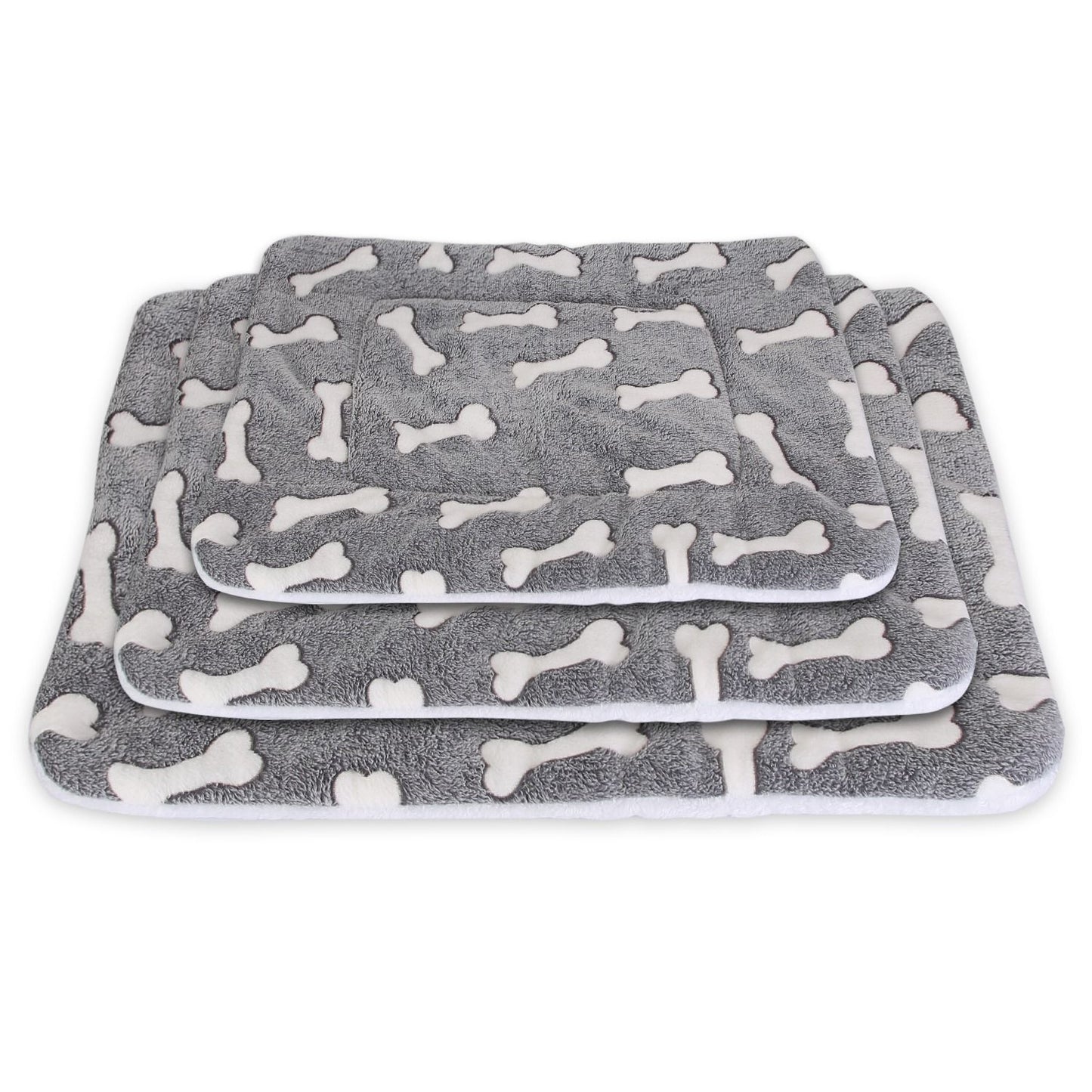 Three grey bone-pattern mats stacked to illustrate available M L XL size range