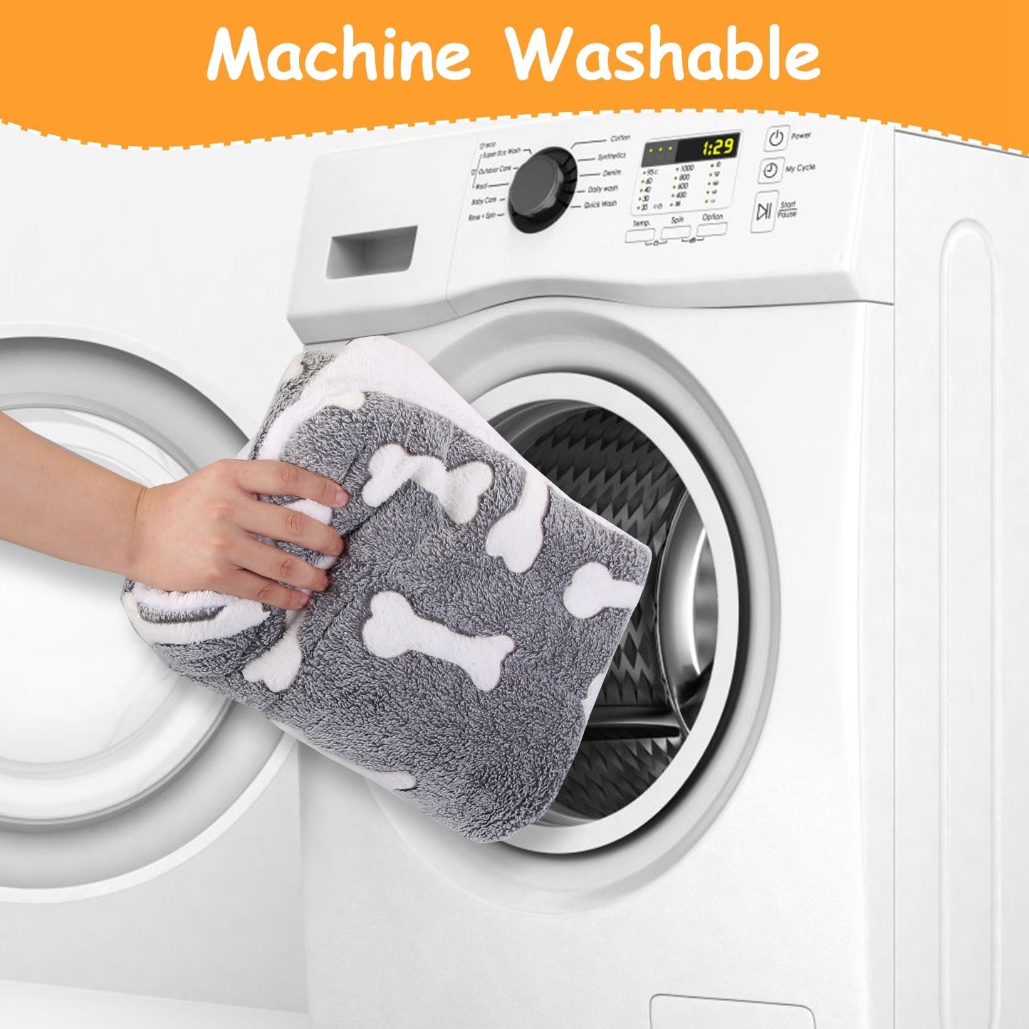 Folded dog mat being placed into a front-load washing machine demonstrating machine washability