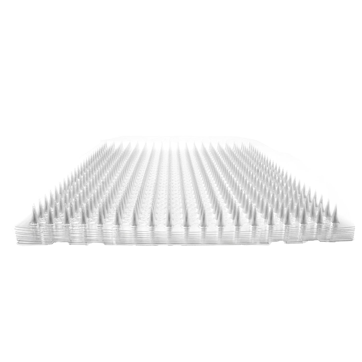 Side profile of stacked transparent spiked mats showing layered spikes and slim profile