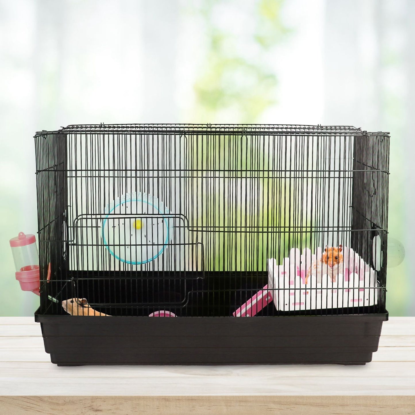 Front view of the assembled hamster cage with wheel, water bottle, food bowl and loft