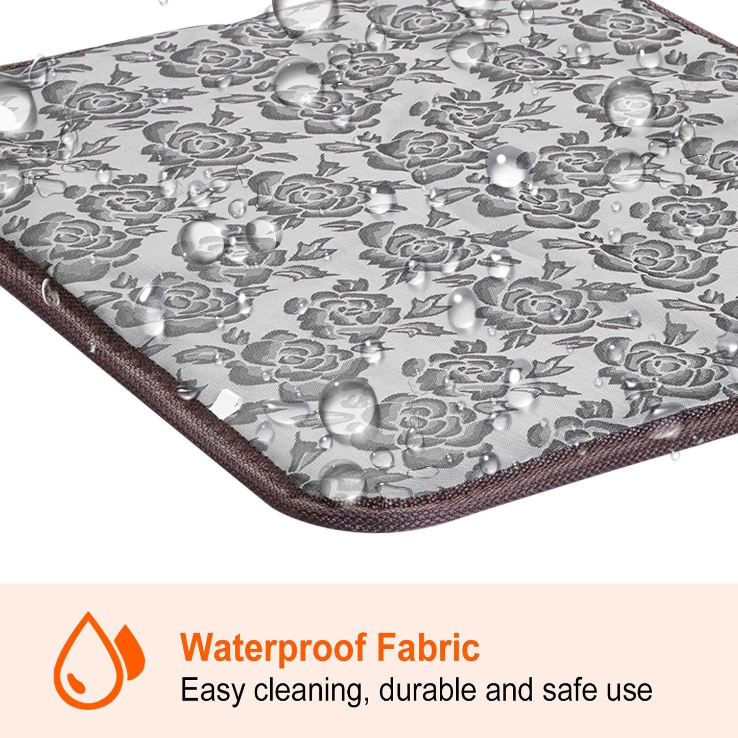 Close-up of waterproof floral fabric on pet heating pad with water droplets beading on surface