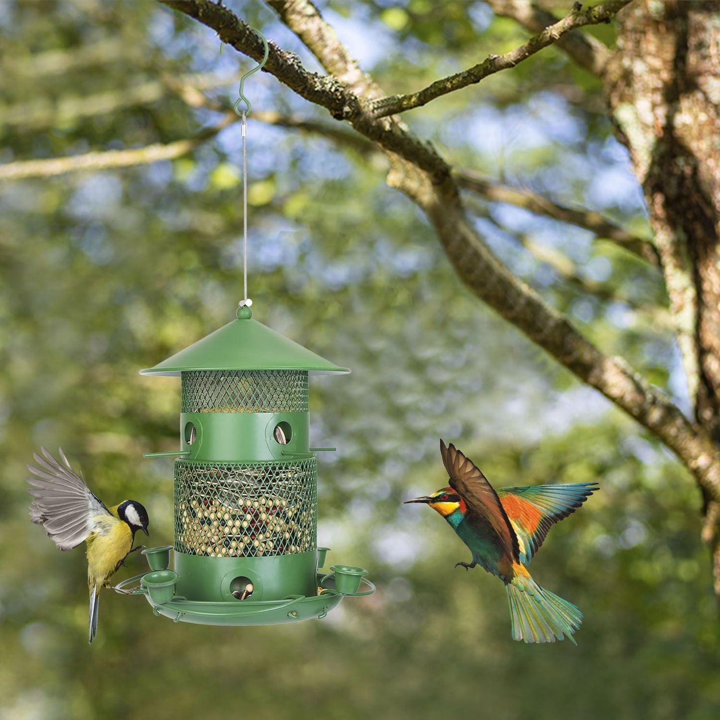 Hanging bird feeder blending into tree foliage with birds approaching perches