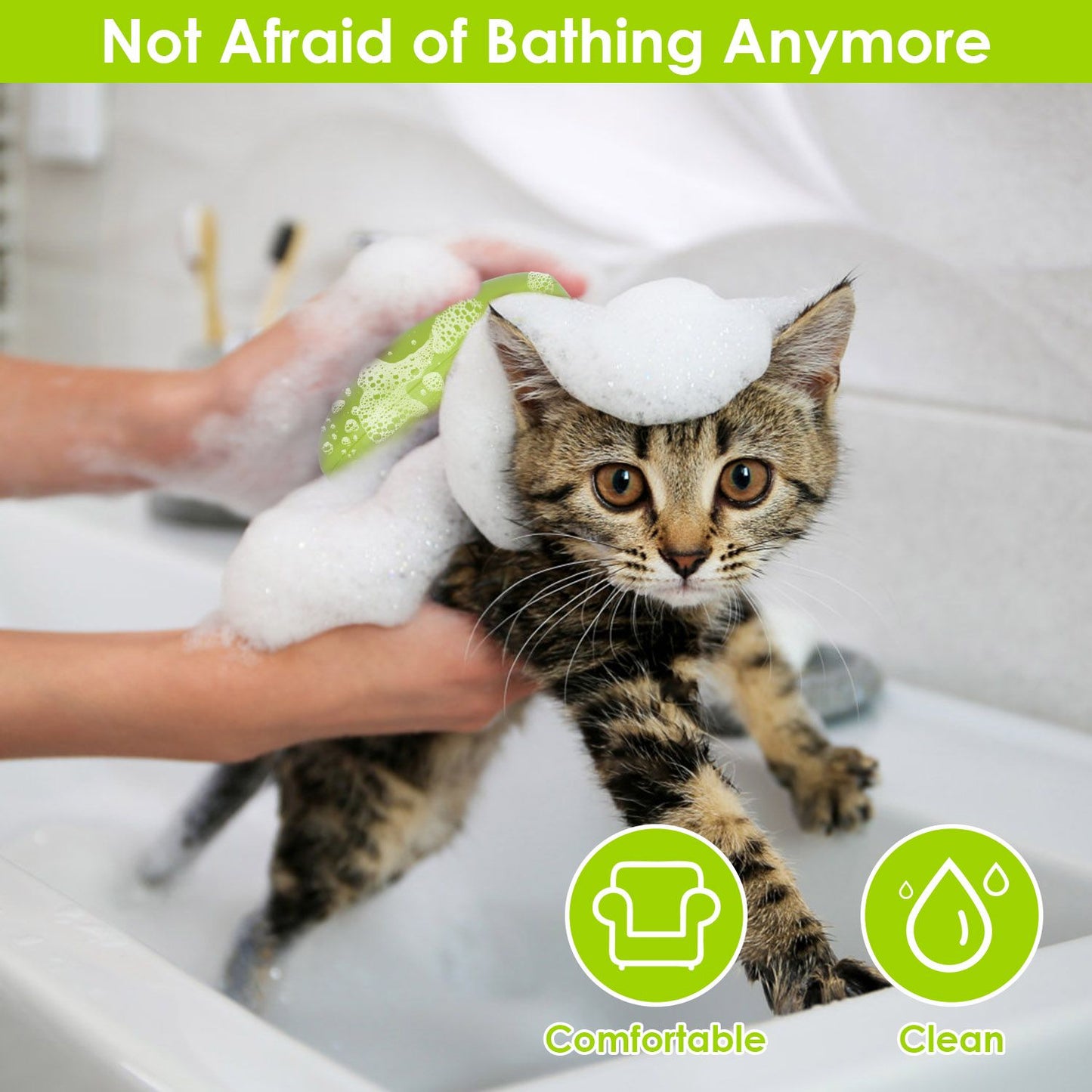 Green grooming brush with comb teeth used to lather and clean a cat in a sink bath