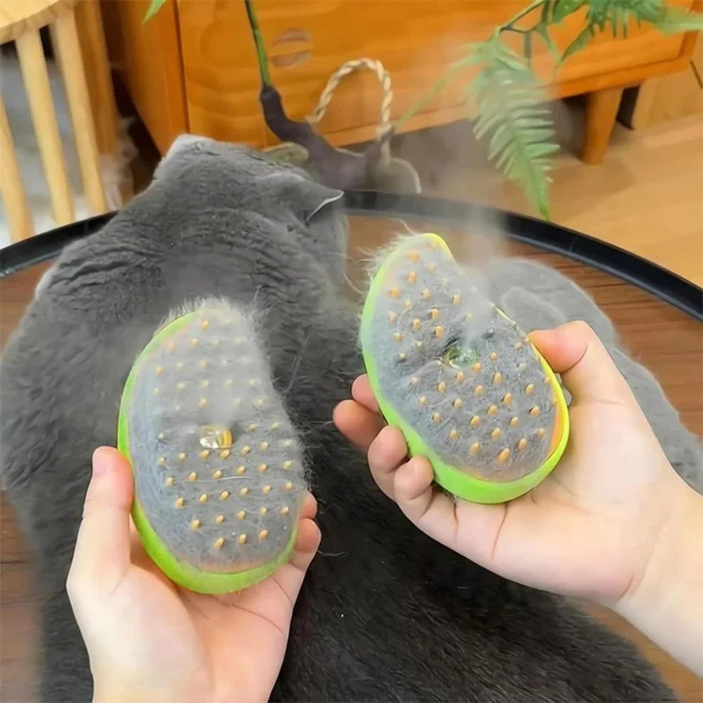 Two brush halves showing collected fur and steam rising after grooming
