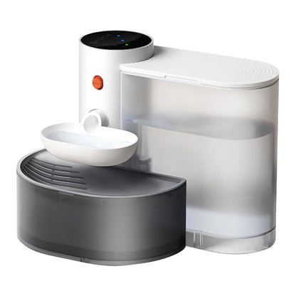 Two cats using the automatic water fountain together in a living area