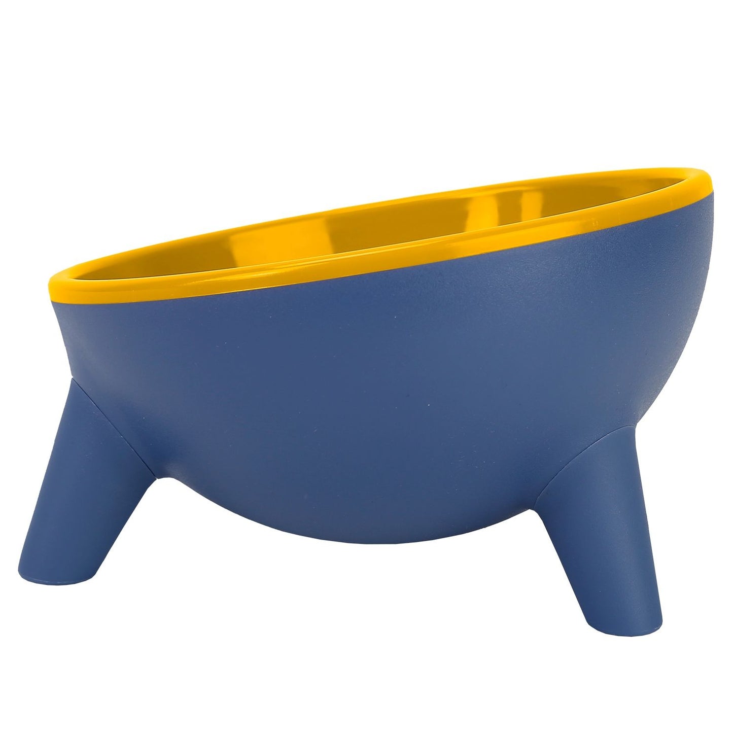 Cat eating from low elevated blue bowl with yellow interior against tiled wall on wood floor