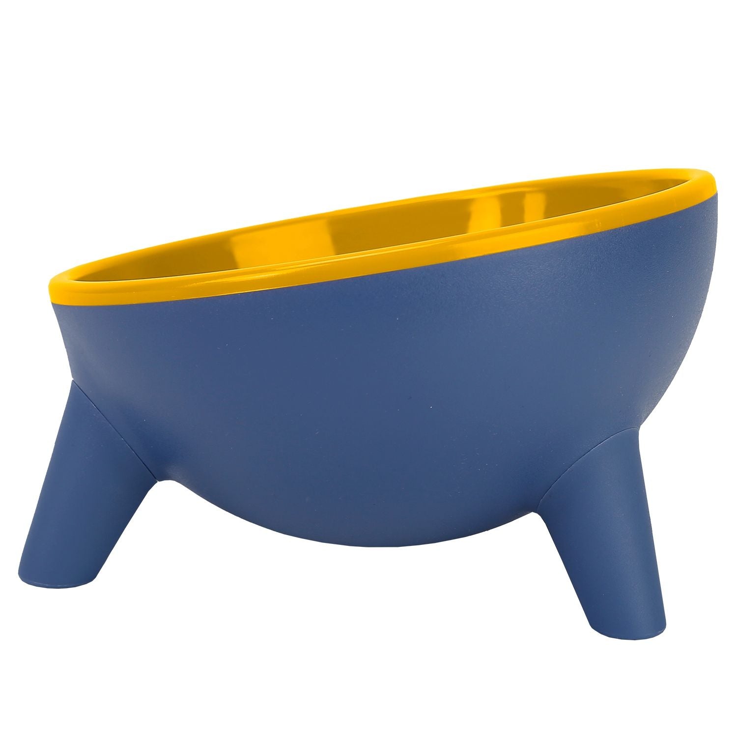 Cat eating from low elevated blue bowl with yellow interior against tiled wall on wood floor