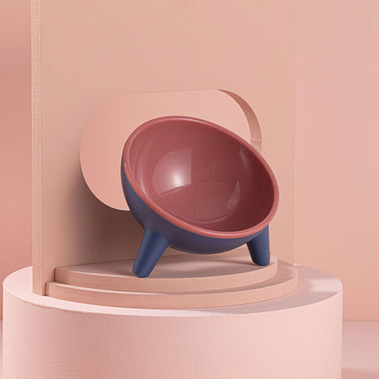 Tilted bowl showing arc inner design with food centered and 8.45oz capacity text