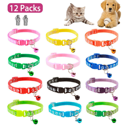 Twelve colorful paw-print cat collars with bells and two metal name-tag capsules