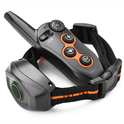 Angled close-up of transmitter resting on the adjustable collar and receiver, showing buttons and buckle