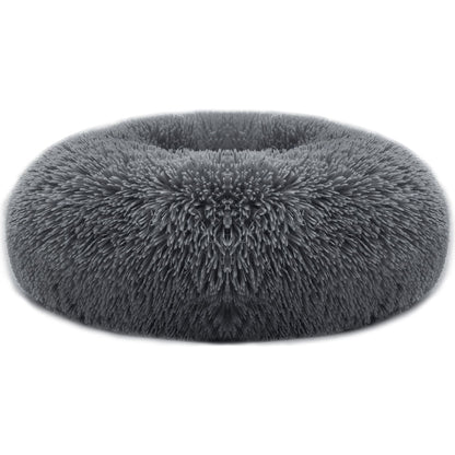 Dark grey round plush donut pet bed with fluffy surface and bolstered edge