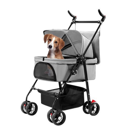Gray pet stroller with removable carrier, mesh canopy, four wheels and lower storage basket