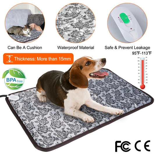 Gray floral heated pet pad on couch with connector and trim