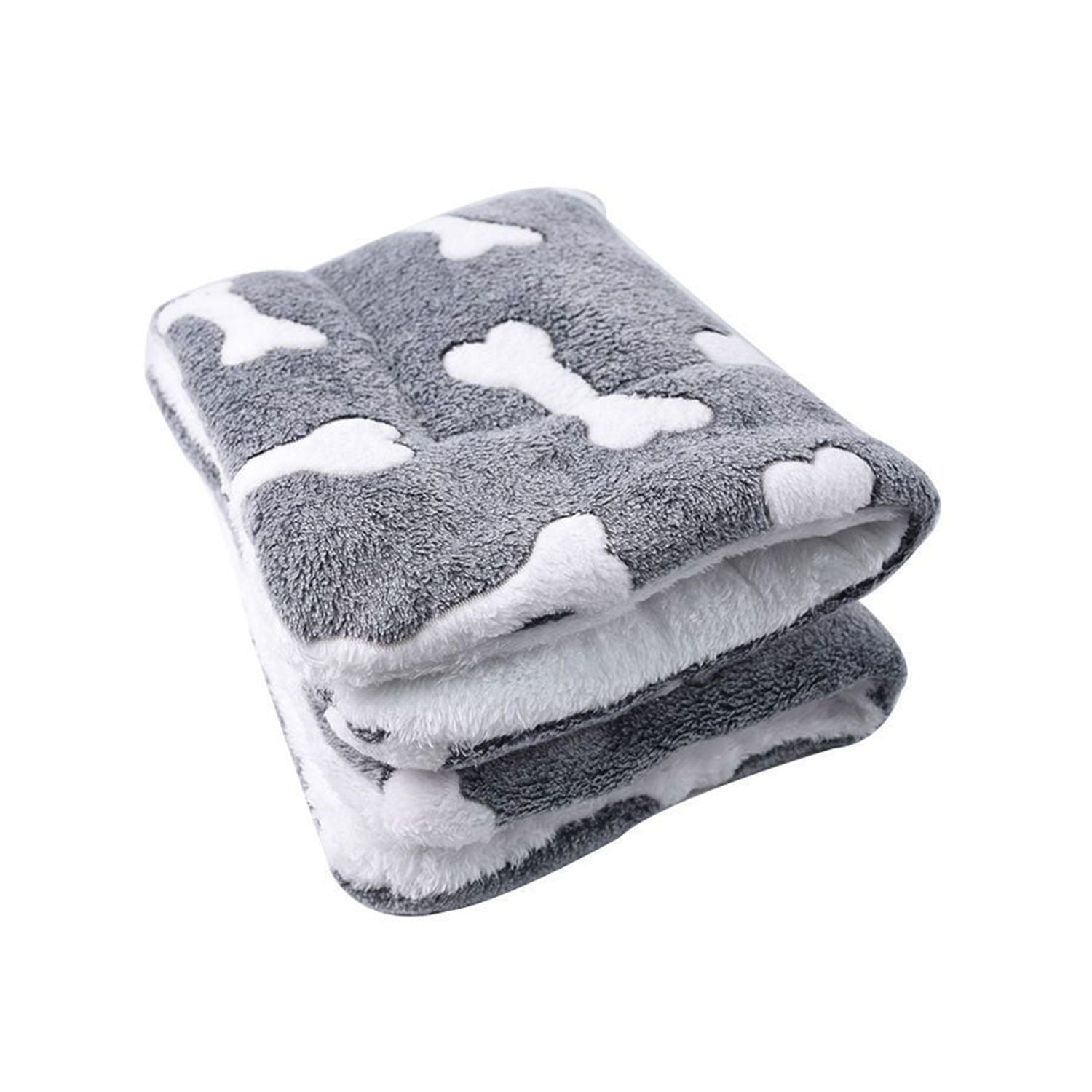 Folded grey bone-pattern dog mat stacked to show compact, portable storage