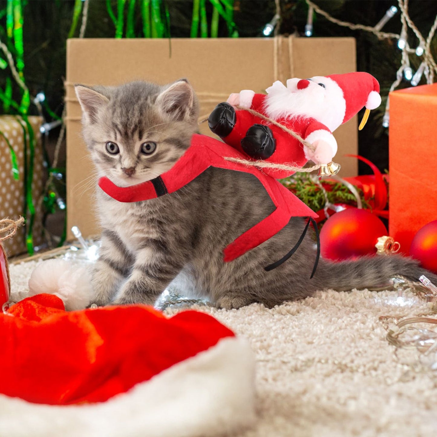 detailed angle of plush Santa on saddle showing felt and straps