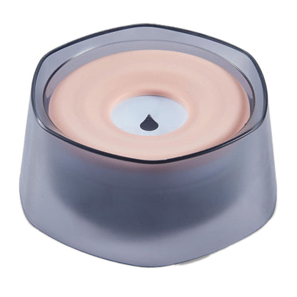 Top view of pet water bowl with pink floating silicone disk and smoky translucent base