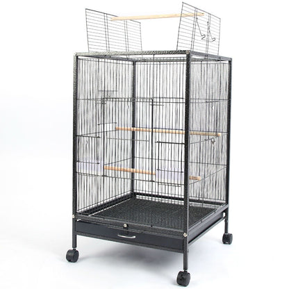 Empty black wrought-iron bird cage on rolling stand with raised top opening and wooden perches