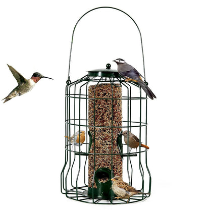 Filled bird feeder with metal cage and transparent seed tube showing small birds at the feeding ports