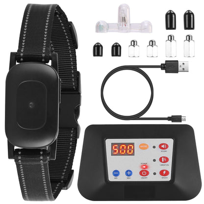 Black nylon dog training collar with receiver, transmitter display, contact points, silicone caps, USB cable and test bulb