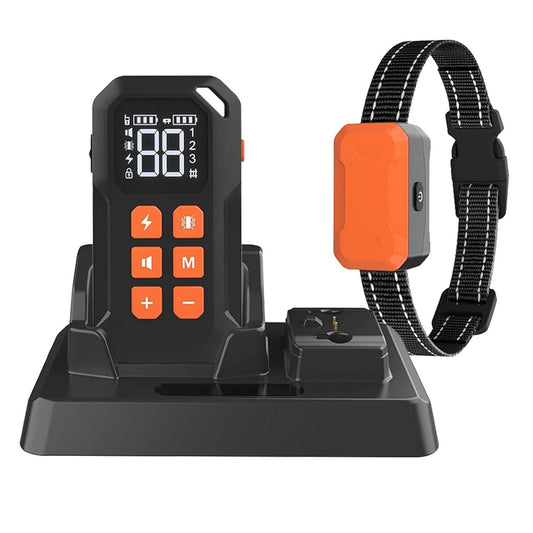 Remote transmitter in charging cradle with receiver collar on charging base, black and orange design