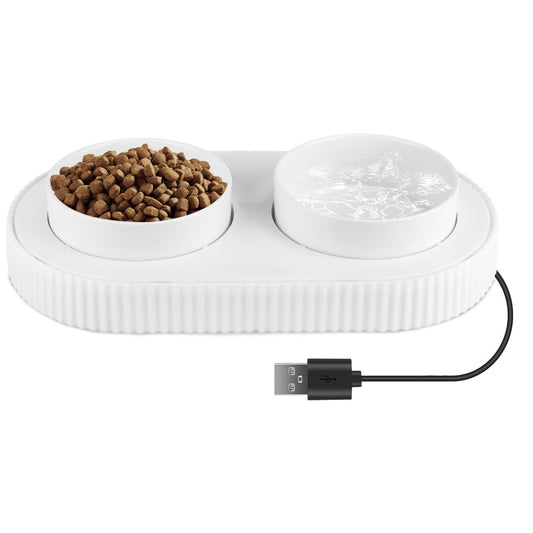 Dual white heated pet bowl with ceramic food and water bowls and USB cable on oval ribbed base