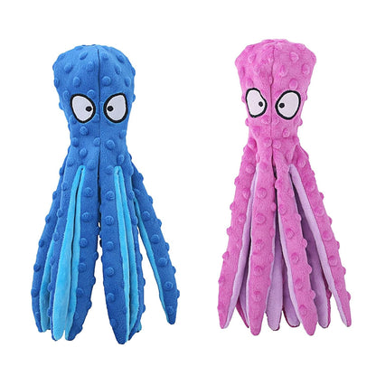 Blue and pink octopus-shaped plush squeaky dog toys side by side on white background
