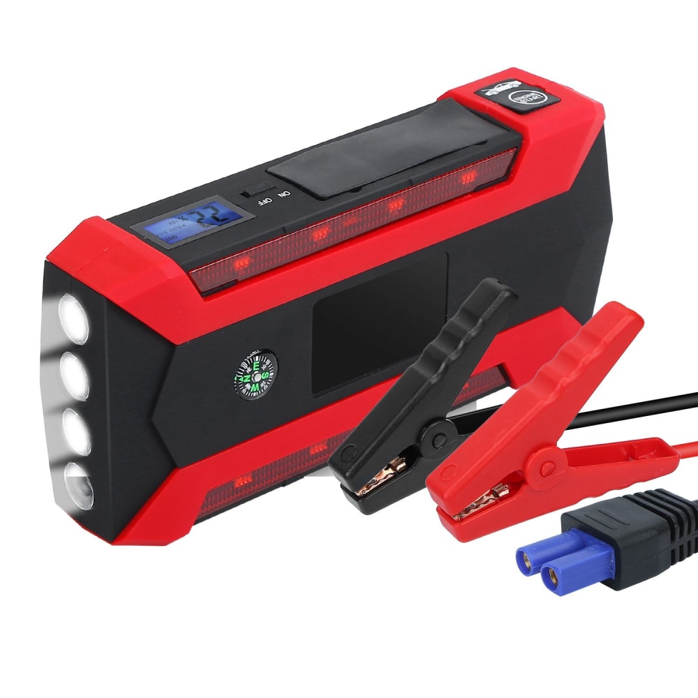 Portable jump starter with LED lights, built-in compass, and color-coded cables for easy car battery charging, featuring a digital display and rugged red and black design.