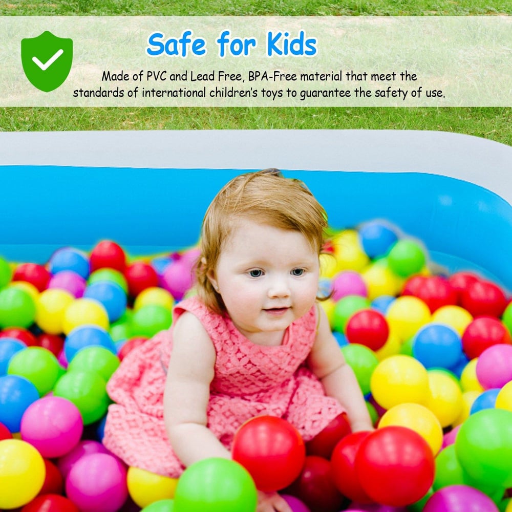 Young child playing in a colorful ball pit filled with bright pink, yellow, green, and blue balls, showcasing a safe and fun environment designed for kids.