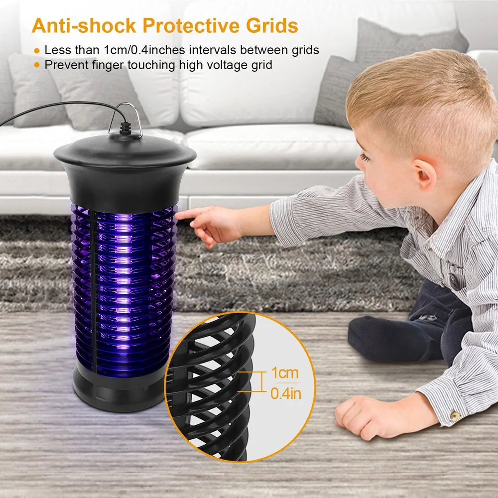 Child reaching towards a purple insect zapper with anti-shock protective grids designed to prevent accidental touching of high voltage components, set on a living room floor.