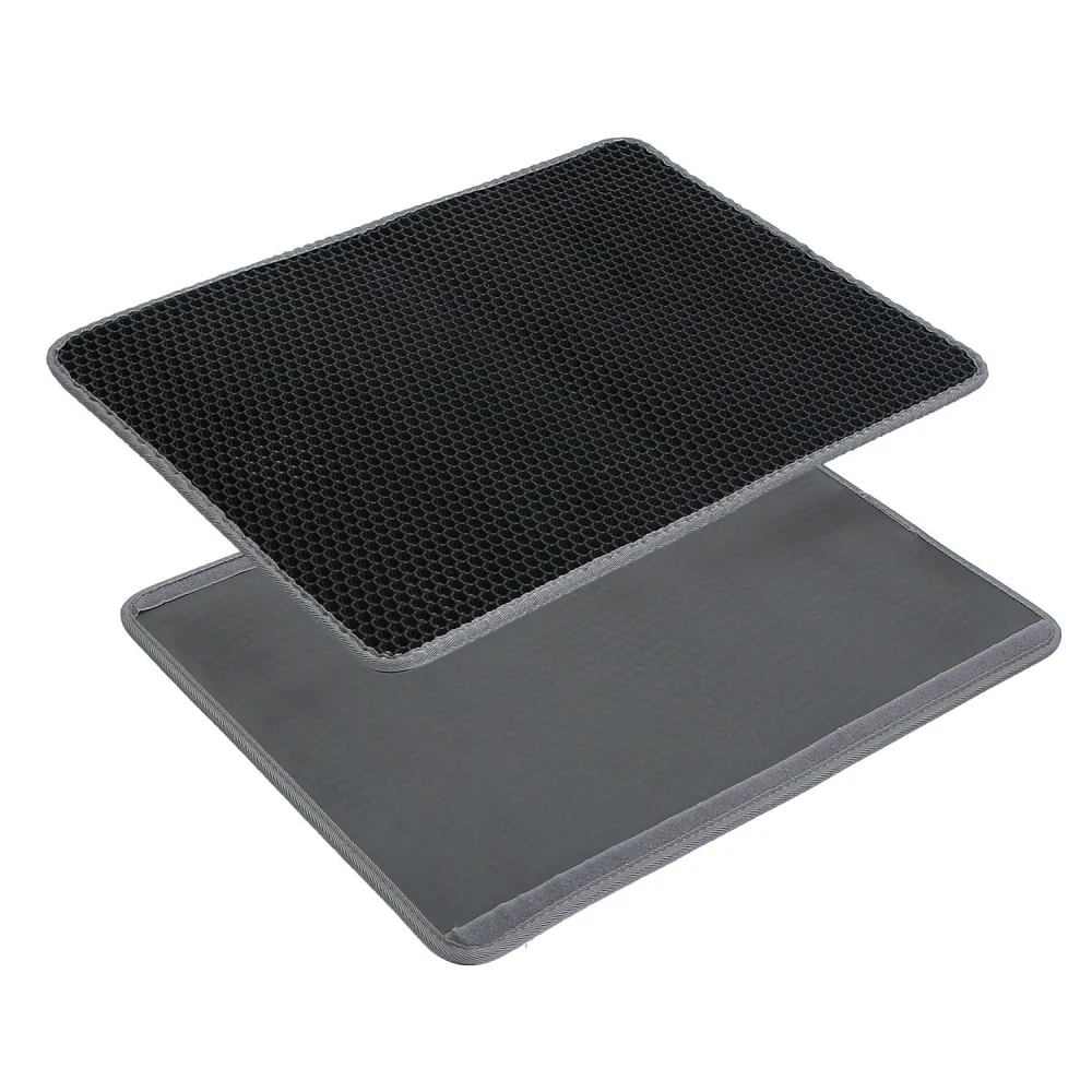 Black honeycomb-patterned multi-purpose mat with a gray underside, ideal for non-slip comfort and floor protection.