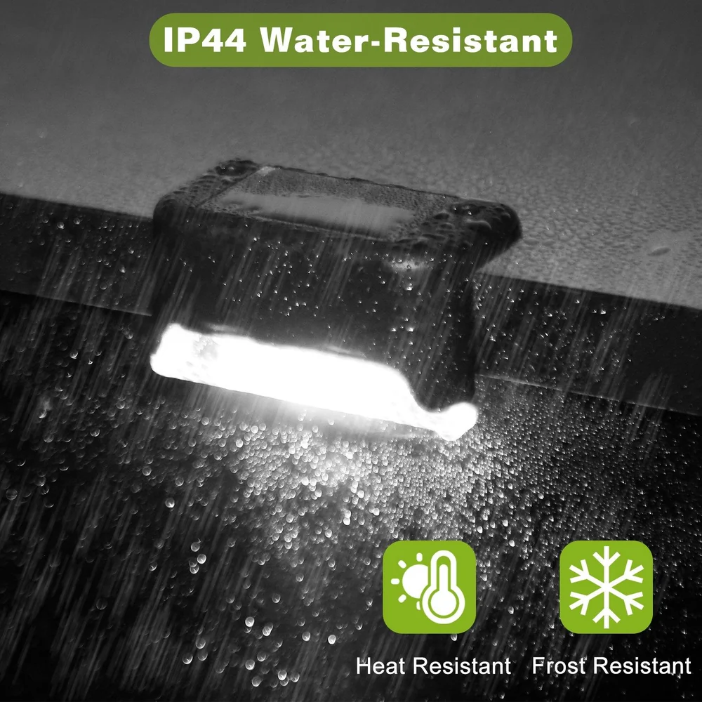 Water-resistant IP44 light fixture with heat and frost resistance, illuminated in rainy conditions.