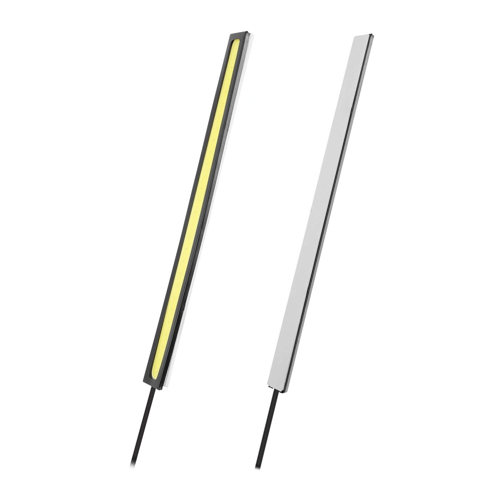 LED strip lighting in black and white finishes, featuring a slim profile and flexible installation options. Perfect for modern home or office decor.