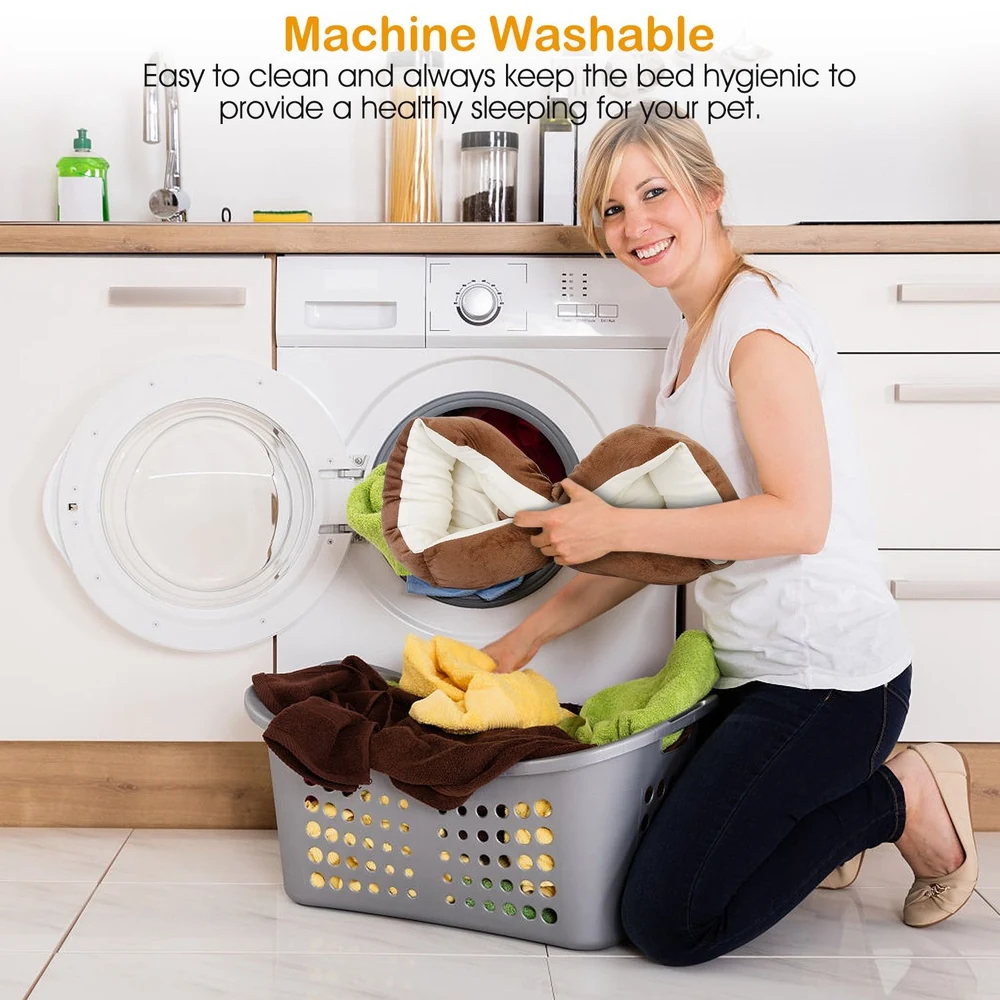 Pet bedding being placed into a washing machine for easy cleaning, alongside colorful towels in a laundry basket, showcasing the product's machine washable feature for maintaining hygiene.