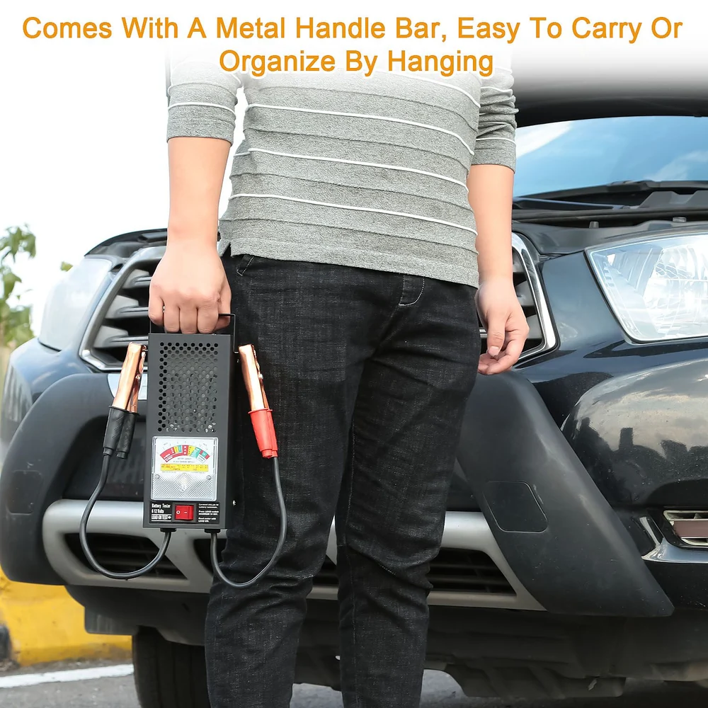 Person holding a portable jump starter with a metal handle bar and color-coded cables, standing near a parked vehicle, showcasing convenience and organization for emergency car battery needs.