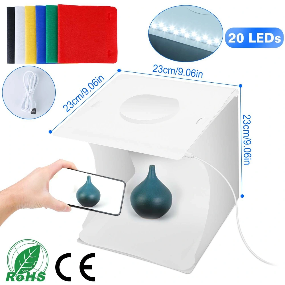 Photo lightbox with 20 LED lights and a dark teal decorative vase being photographed, includes color backdrops in red, yellow, blue, green, and black, perfect for product photography.