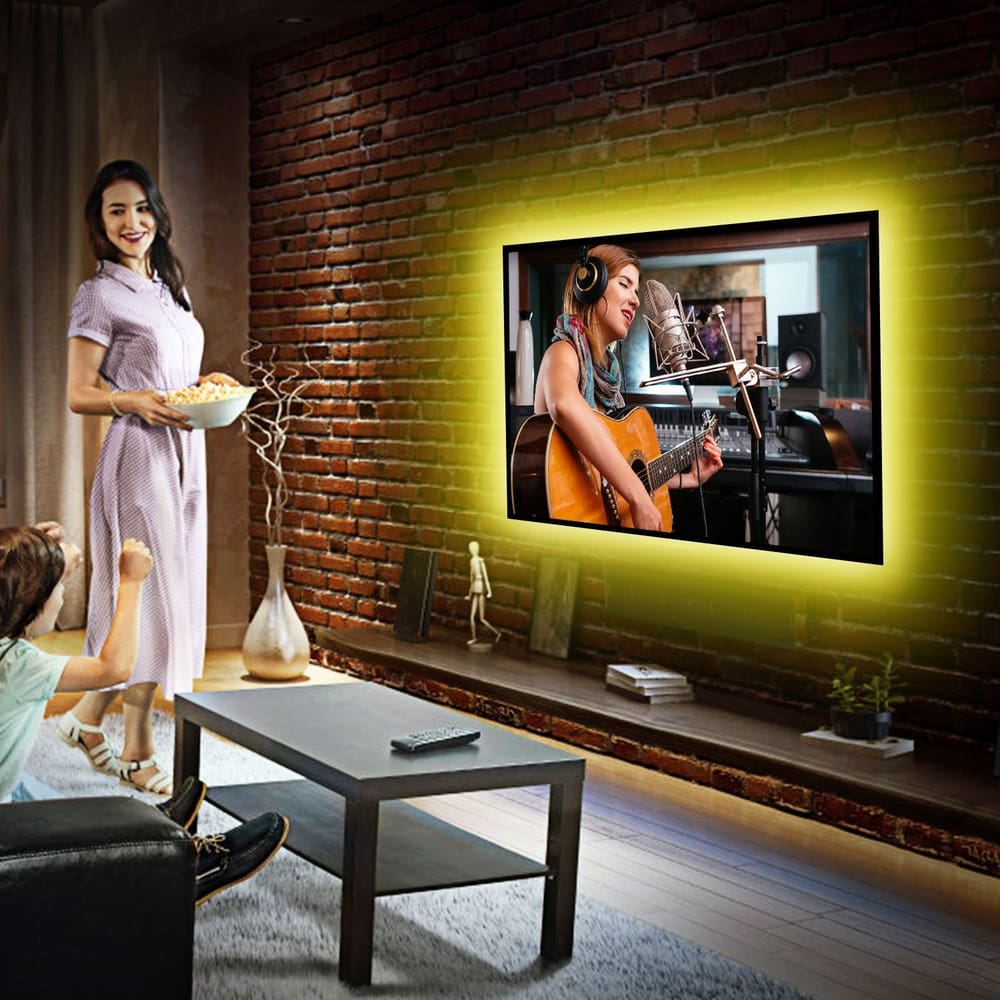 A woman enjoying popcorn while watching a musician play guitar on a television in a cozy living room with a stylish brick wall background.