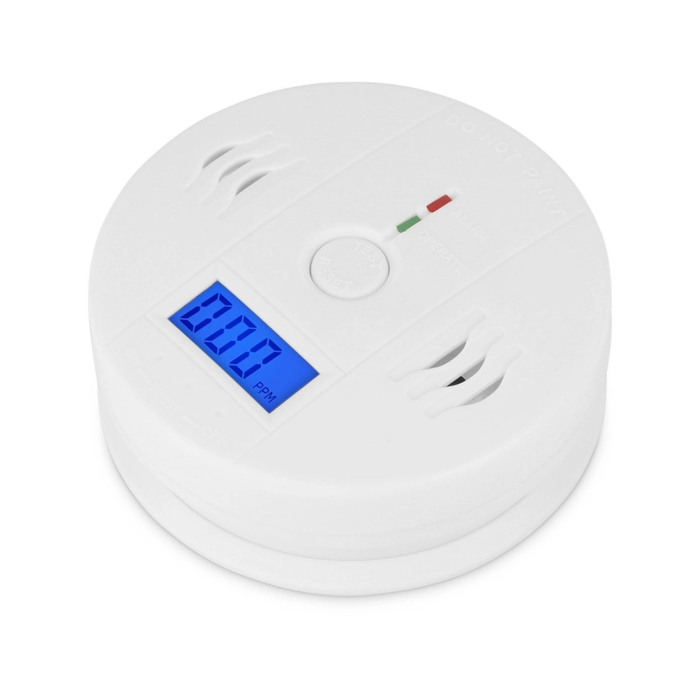 Carbon monoxide detector with digital display showing 000 PPM, featuring test and reset buttons, designed for safety monitoring in homes.