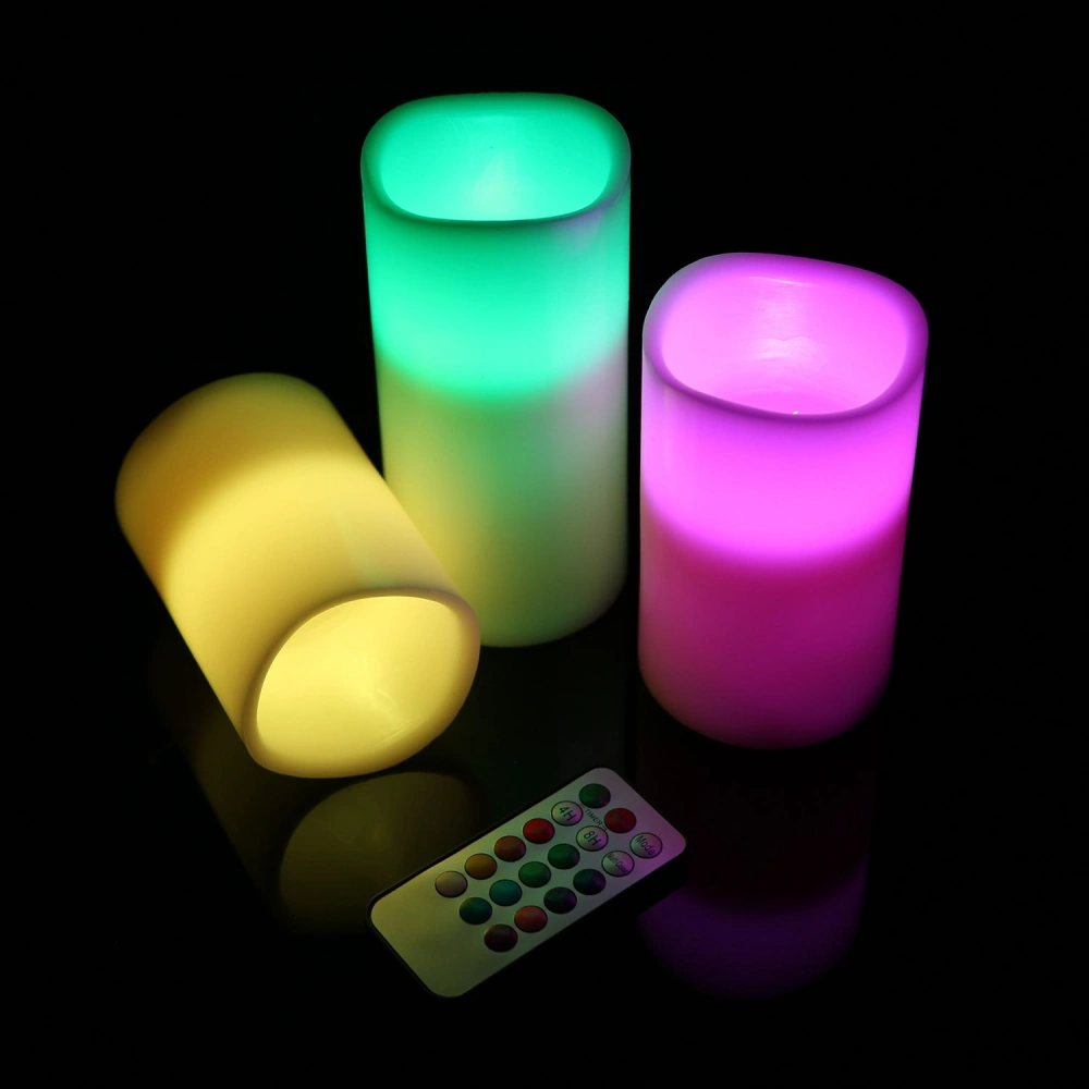 Multicolored LED candle set featuring three cylindrical candles in yellow, green, and pink, with a small remote control for adjusting colors and settings, against a black background.