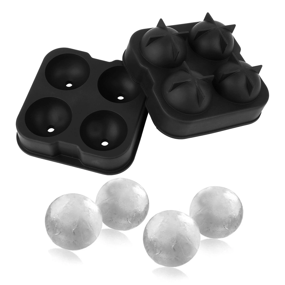 Silicone ice cube tray with four spherical molds and three clear ice balls, ideal for whiskey or cocktails, featuring a stylish black design.